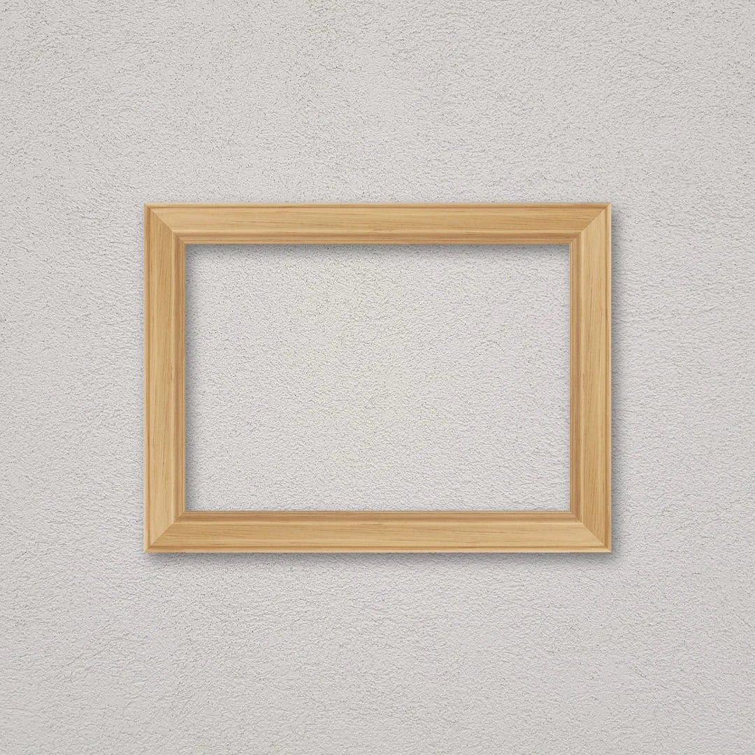 La cornice grezza 21×30 cm a parete di traverso: la cornice pronta per la tua immagine