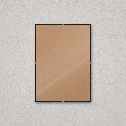 La montatura a giorno 21×29,7 cm a parete, senza stampa: attraverso il fronte si vede il retro in MDF