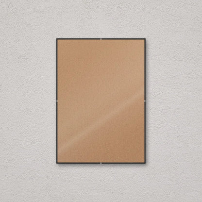 La montatura a giorno 29,7×42 cm a parete, senza stampa: attraverso il fronte si vede il retro in MDF