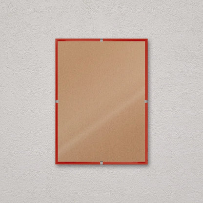 La montatura a giorno 13×18 cm a parete, senza stampa: attraverso il fronte si vede il retro in MDF