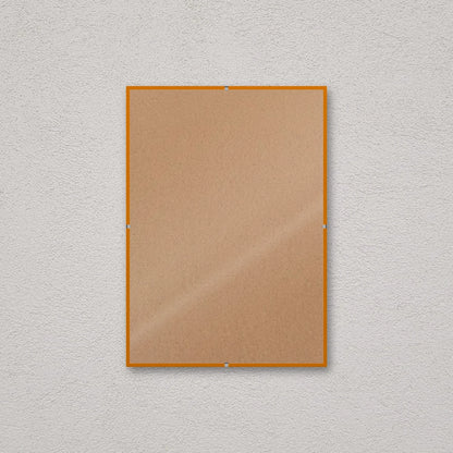 La montatura a giorno 21×29,7 cm a parete, senza stampa: attraverso il fronte si vede il retro in MDF