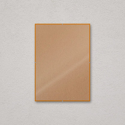 La montatura a giorno 29,7×42 cm a parete, senza stampa: attraverso il fronte si vede il retro in MDF