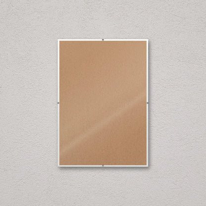 La montatura a giorno 21×30 cm a parete, senza stampa: attraverso il fronte si vede il retro in MDF