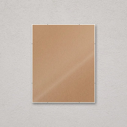 La montatura a giorno 40×50 cm a parete, senza stampa: attraverso il fronte si vede il retro in MDF
