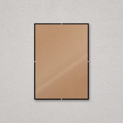 La montatura a giorno 21×29,7 cm a parete, senza stampa: attraverso il fronte si vede il retro in MDF