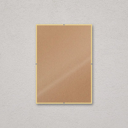 La montatura a giorno 21×30 cm a parete, senza stampa: attraverso il fronte si vede il retro in MDF